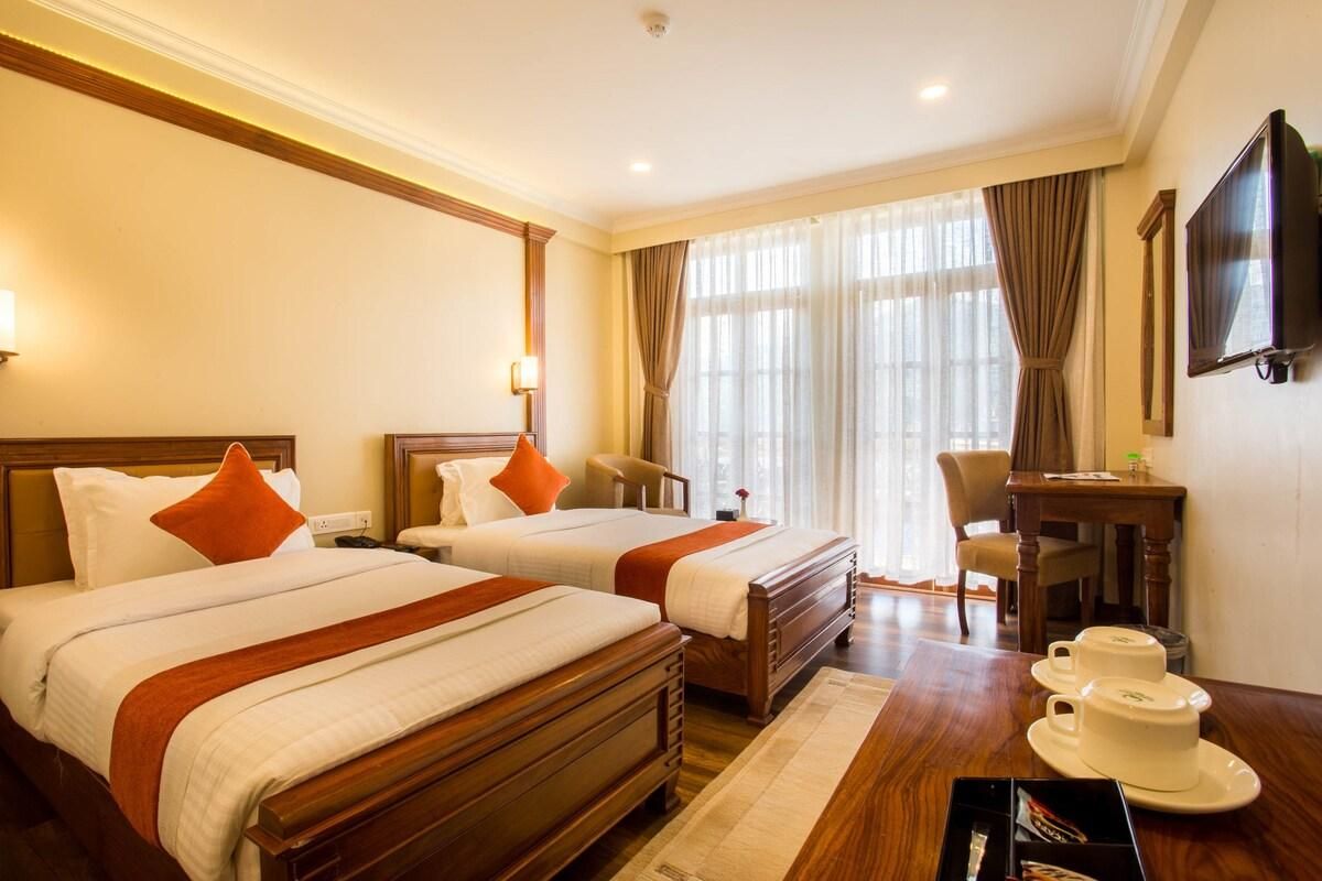 Deluxe with Private Balcony — Double / Twin