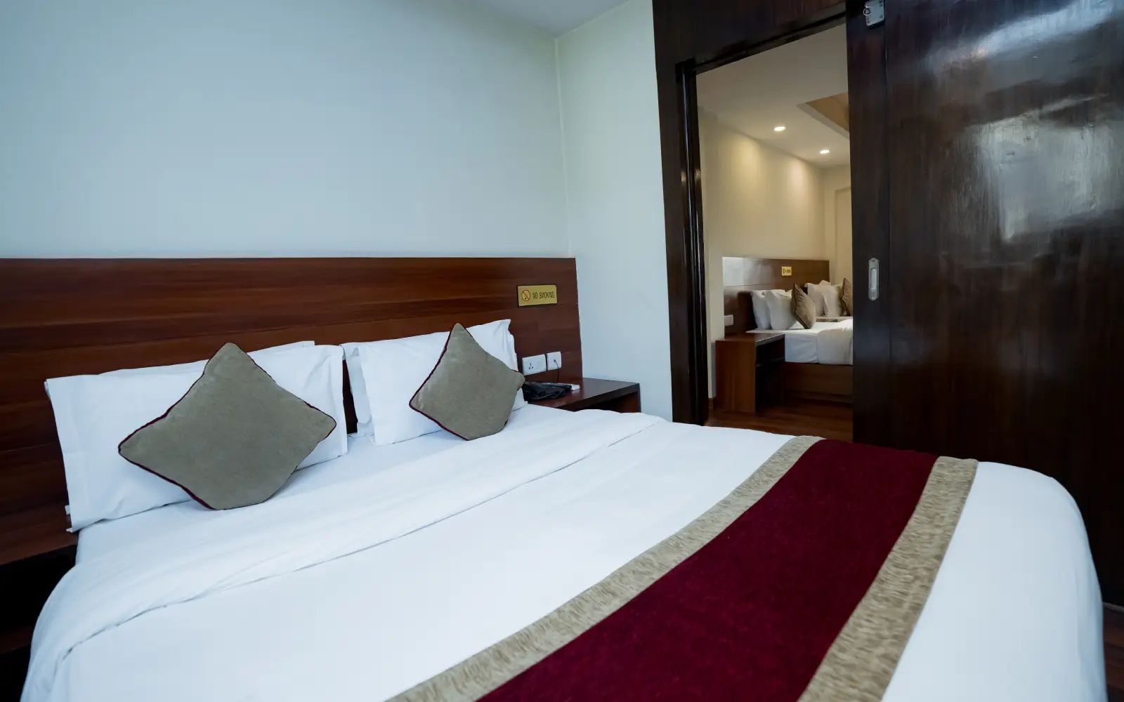 Deluxe Family Suite — Two Interconnected Rooms