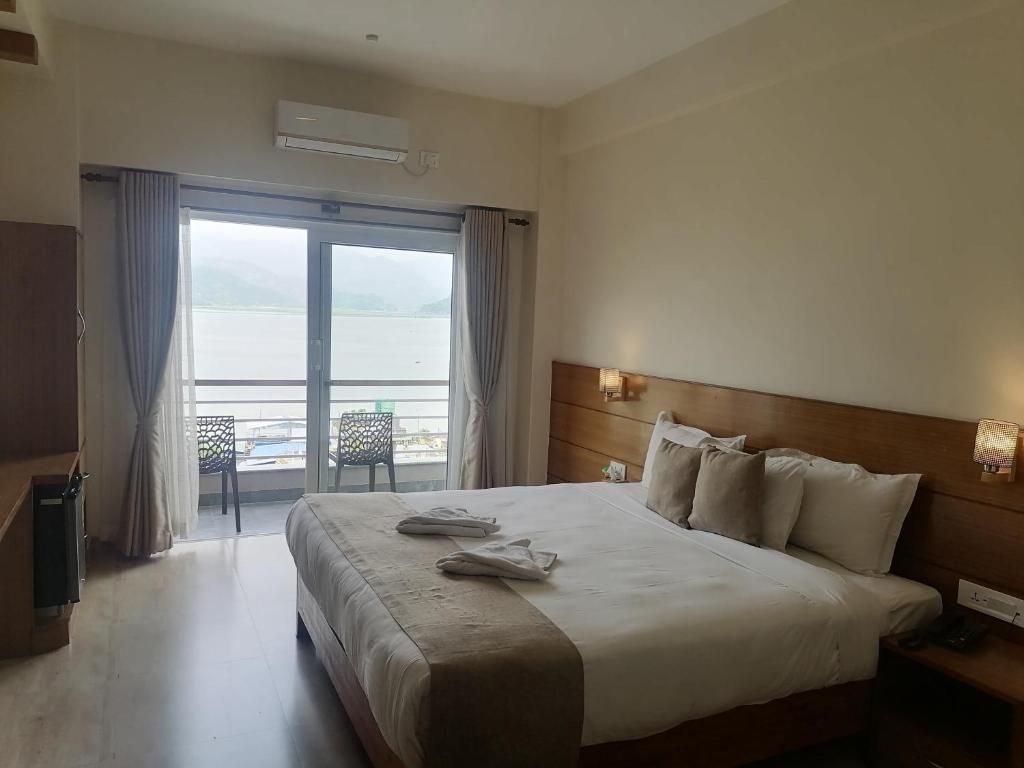Double with Balcony & Lake View
